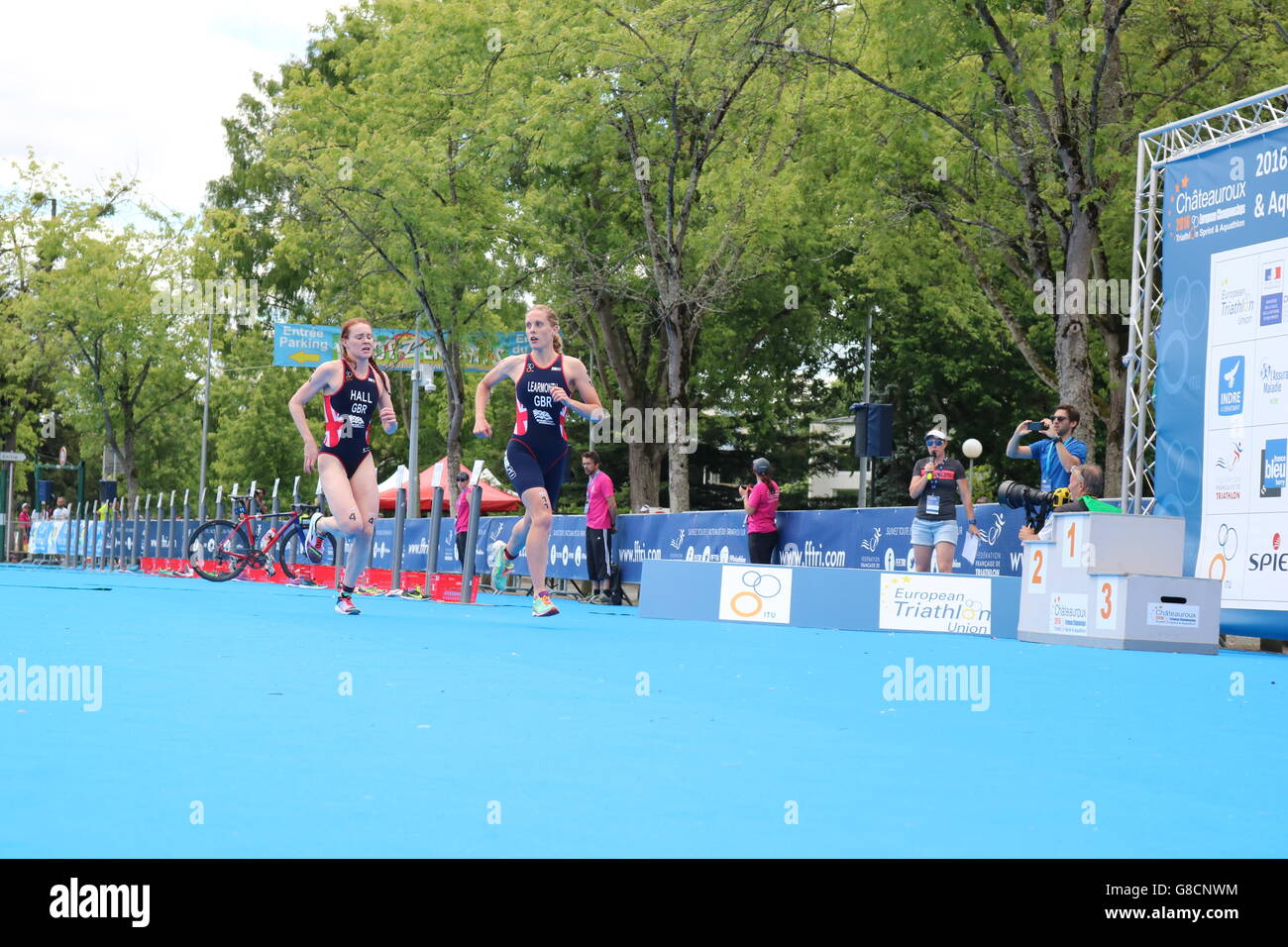 Team GB triathletes Jess Learmonth and Lucy Hall begin the run leg of the Elite women Sprint Championships in France. Stock Photo