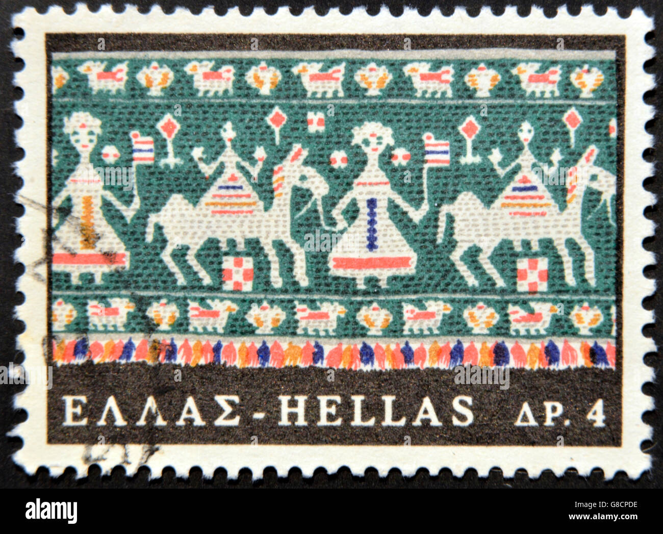 GREECE - CIRCA 1980: A stamp printed in Greece shows traditional weaving, circa 1980 Stock Photo