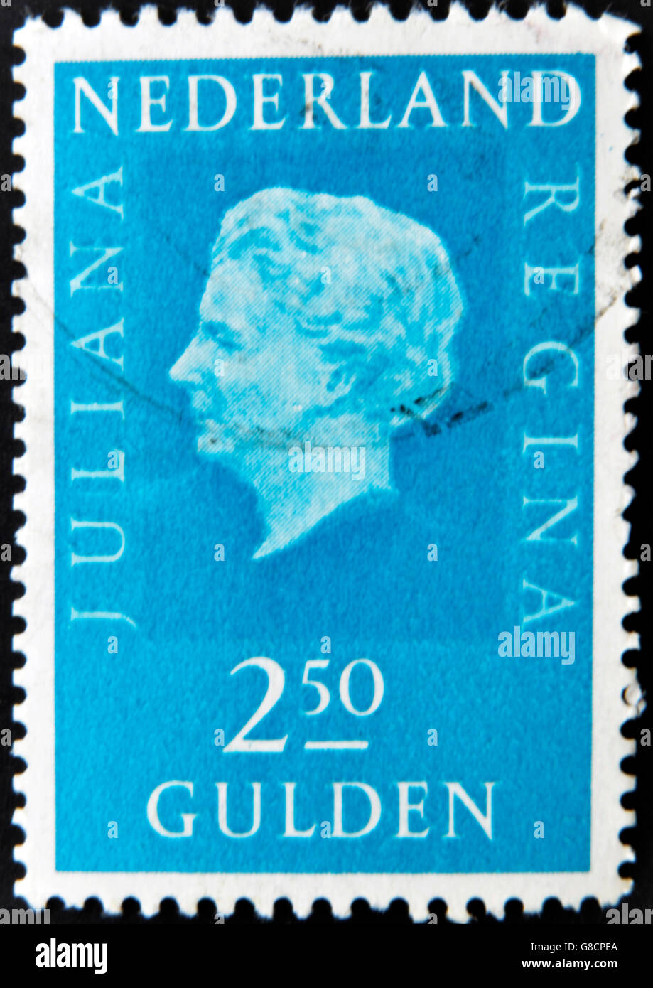 HOLLAND - CIRCA 1969: A stamp printed in the Netherlands showing a portrait of Queen Juliana, circa 1969. Stock Photo
