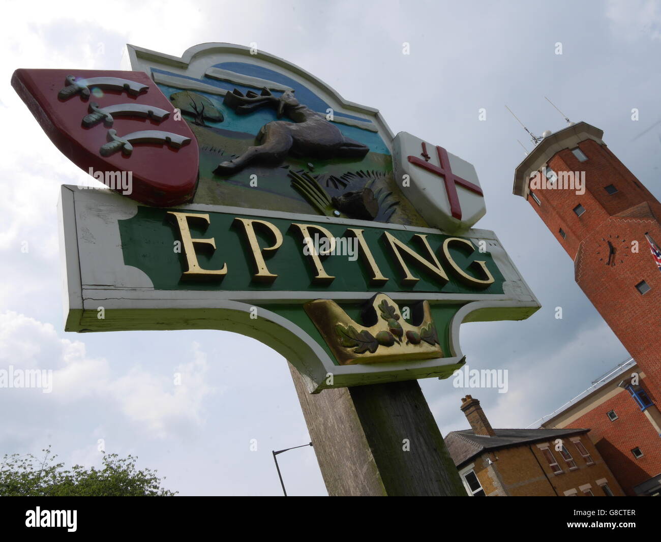 Epping town sign, in Essex, with Epping Forest District council offices