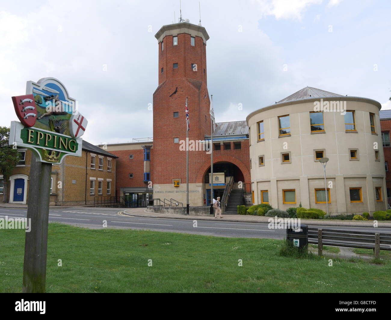 Epping town sign, in Essex, with Epping Forest District council offices