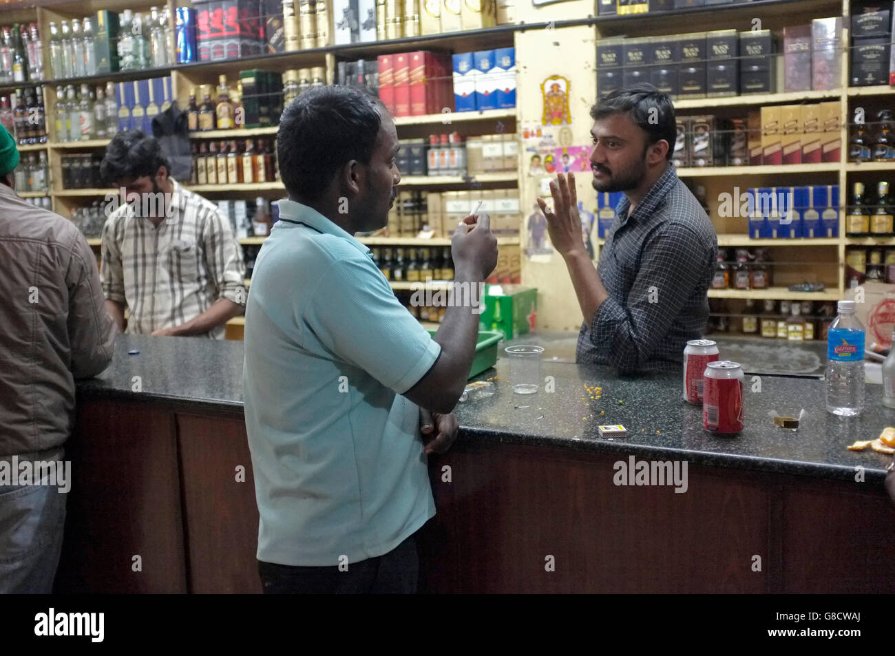 scenes from indian wine shops, a cross between a liquor store and a bar