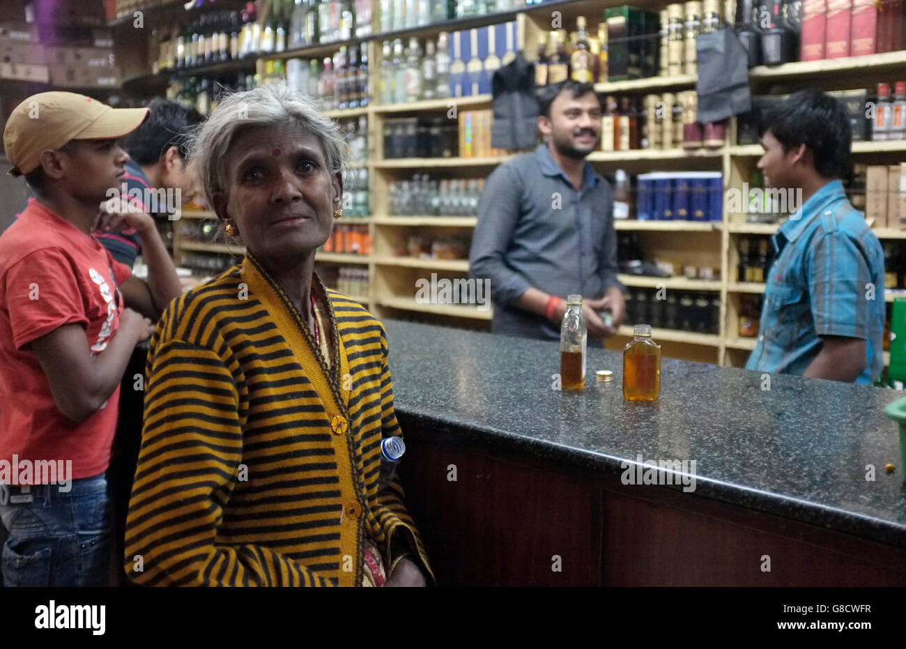 scenes from indian wine shops, a cross between a liquor store and a bar