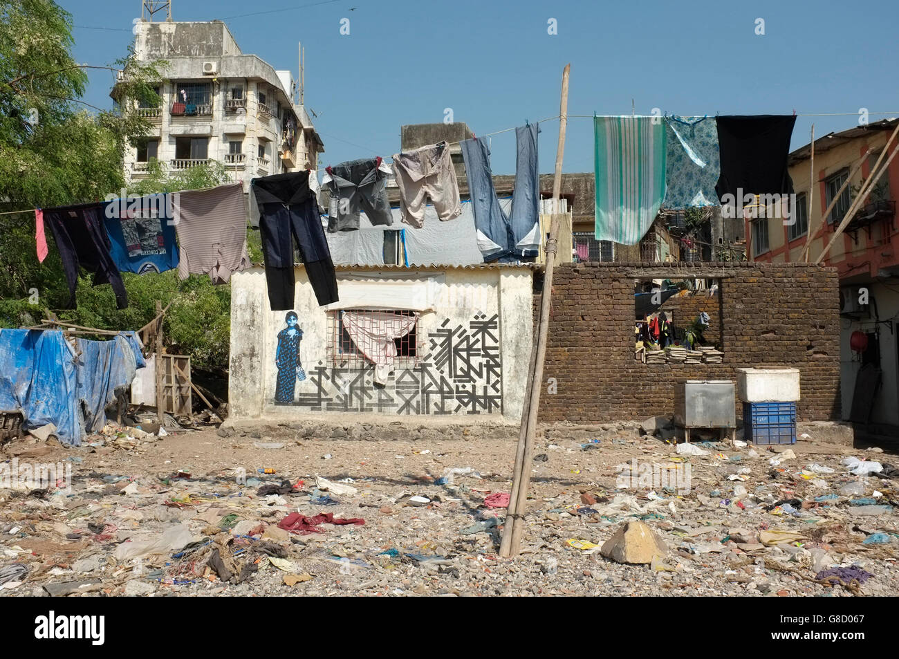 washing line / cothes drying on the beach front at the slum area of chimbai village, bandra, mumbai, india Stock Photo