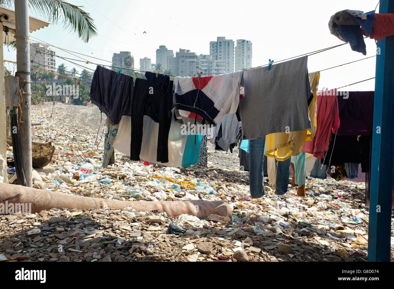 washing line / cothes drying on the beach front at the slum area of chimbai village, bandra, mumbai, india Stock Photo