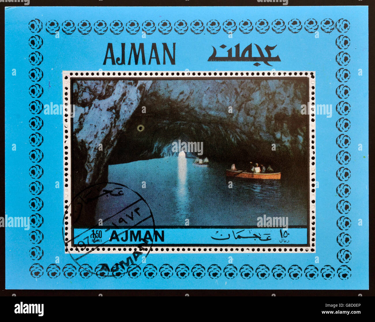 AJMAN - CIRCA 1972 : stamp printed in Ajman shows the Blue Grotto in Capri, Italy, circa 1972 Stock Photo