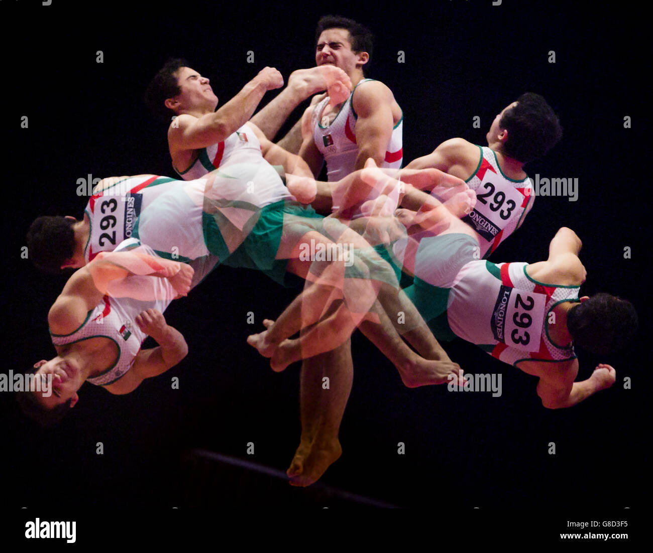 Multiple exposure created in camera of Mexico's Fabian DeLuna competing on the Vault Table during day four of the 2015 World Gymnastic Championships at The SSE Hydro, Glasgow. Stock Photo