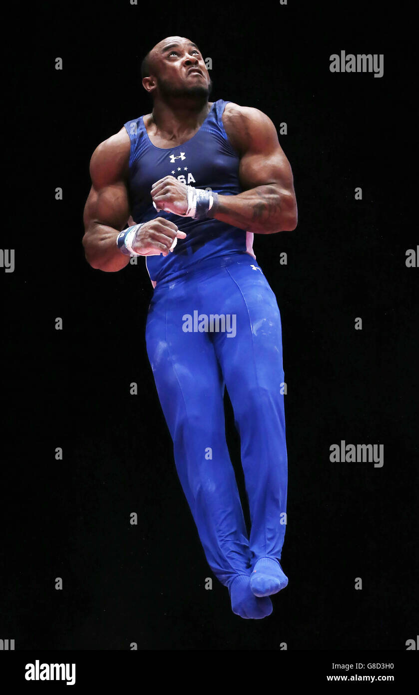 USA's Donnell Whittenburg dismounts after competing on the Still Rings during day four of the 2015 World Gymnastic Championships at The SSE Hydro, Glasgow. Stock Photo