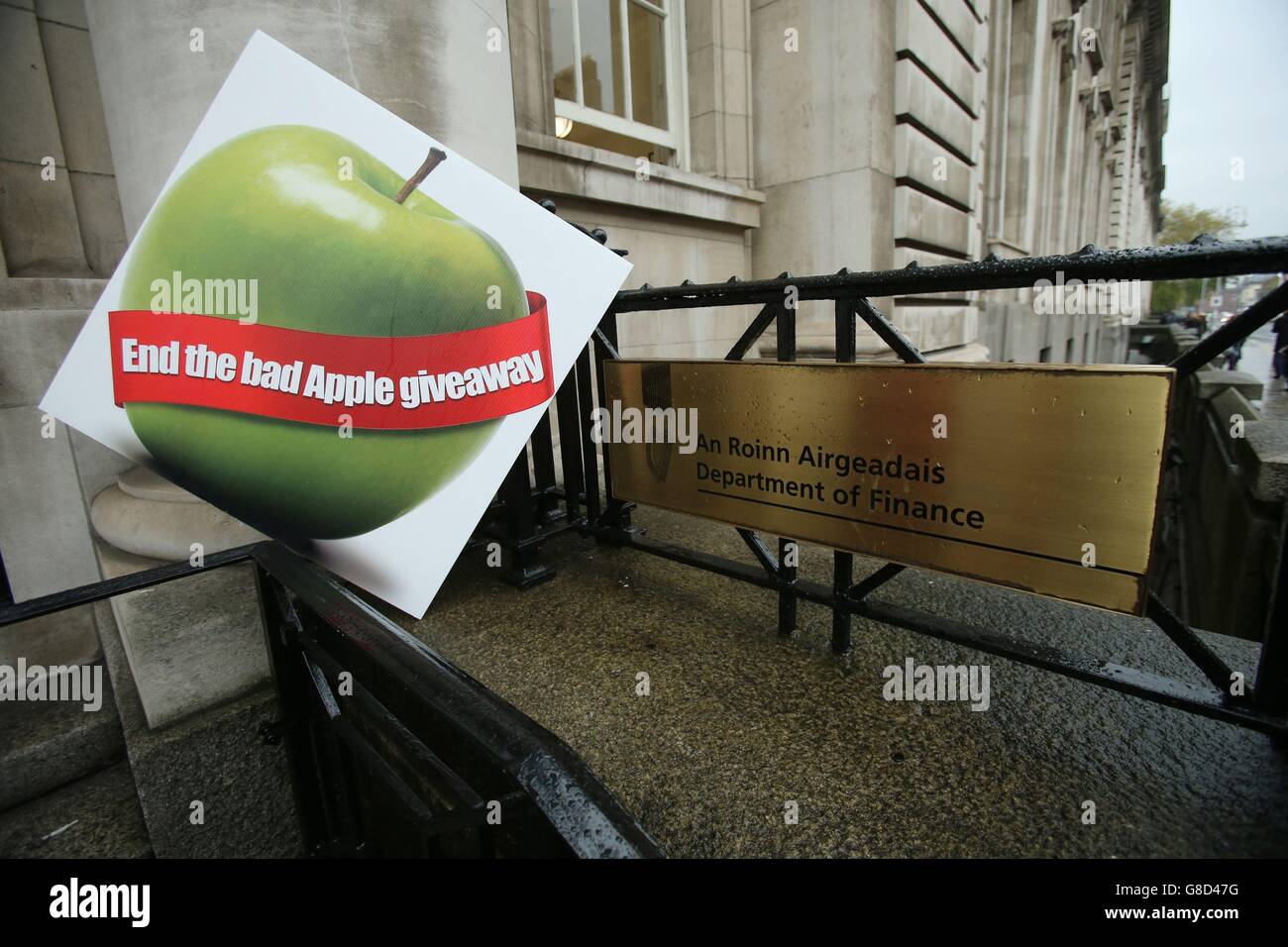 Members of the Debt & Development Coalition Ireland holding a protest outside Department of Finance in Dublin where they are calling for the Public Accounts Committee to investigate the tax rulings system, by which they say Revenue gives away billions in revenues to Apple and other multinational corporations. Stock Photo
