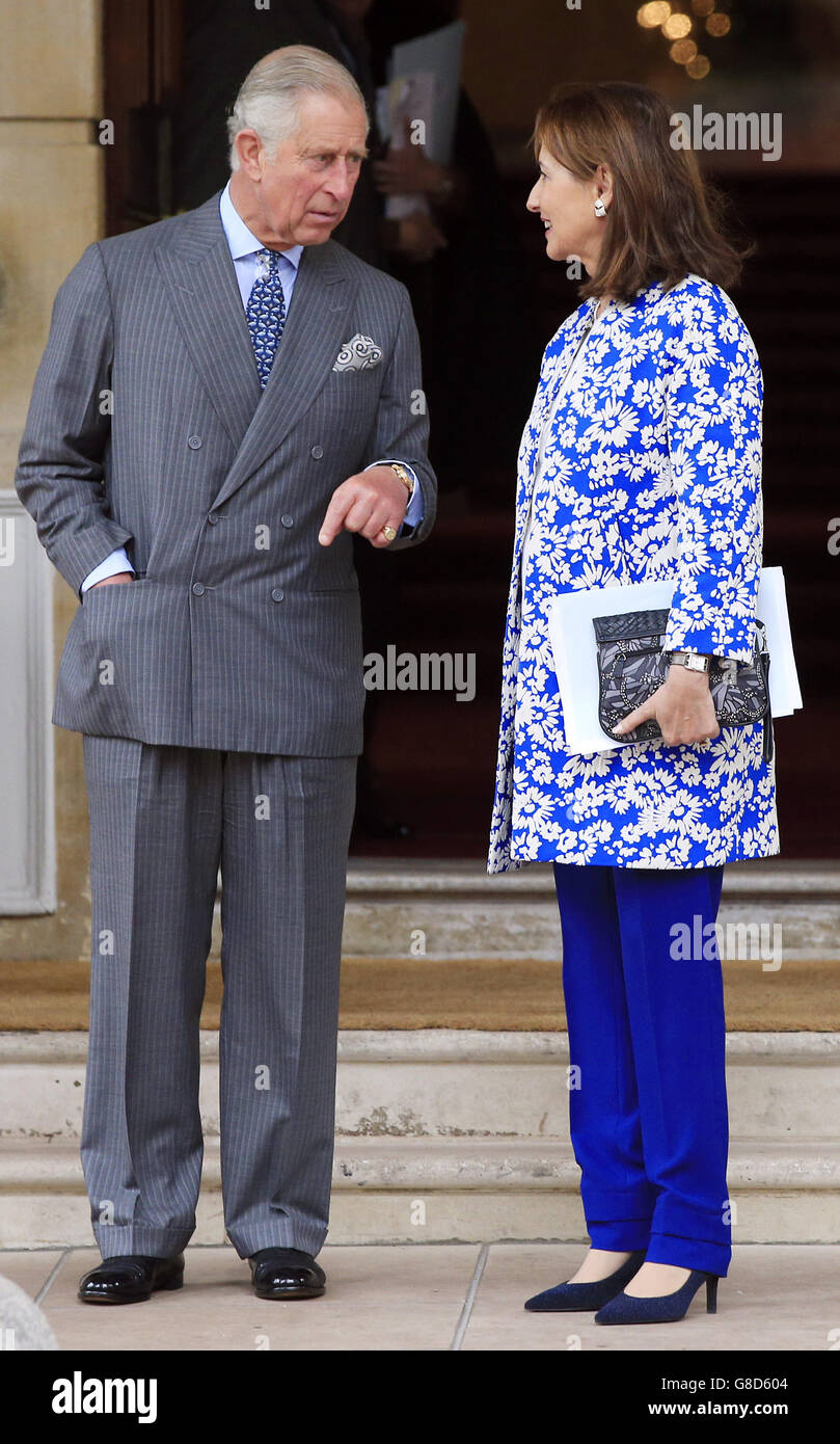 The Prince of Wales and Segolene Royal (right) leave a meeting on forests and climate change at Lancaster House in London, ahead of the upcoming Cop21 United Nations Climate Change Conference in Paris. Stock Photo