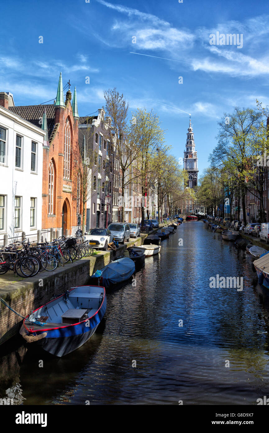 View along the Groenburgwal canal towards the Zuiderkerk in downtown Amsterdam, Netherlands in spring. Stock Photo