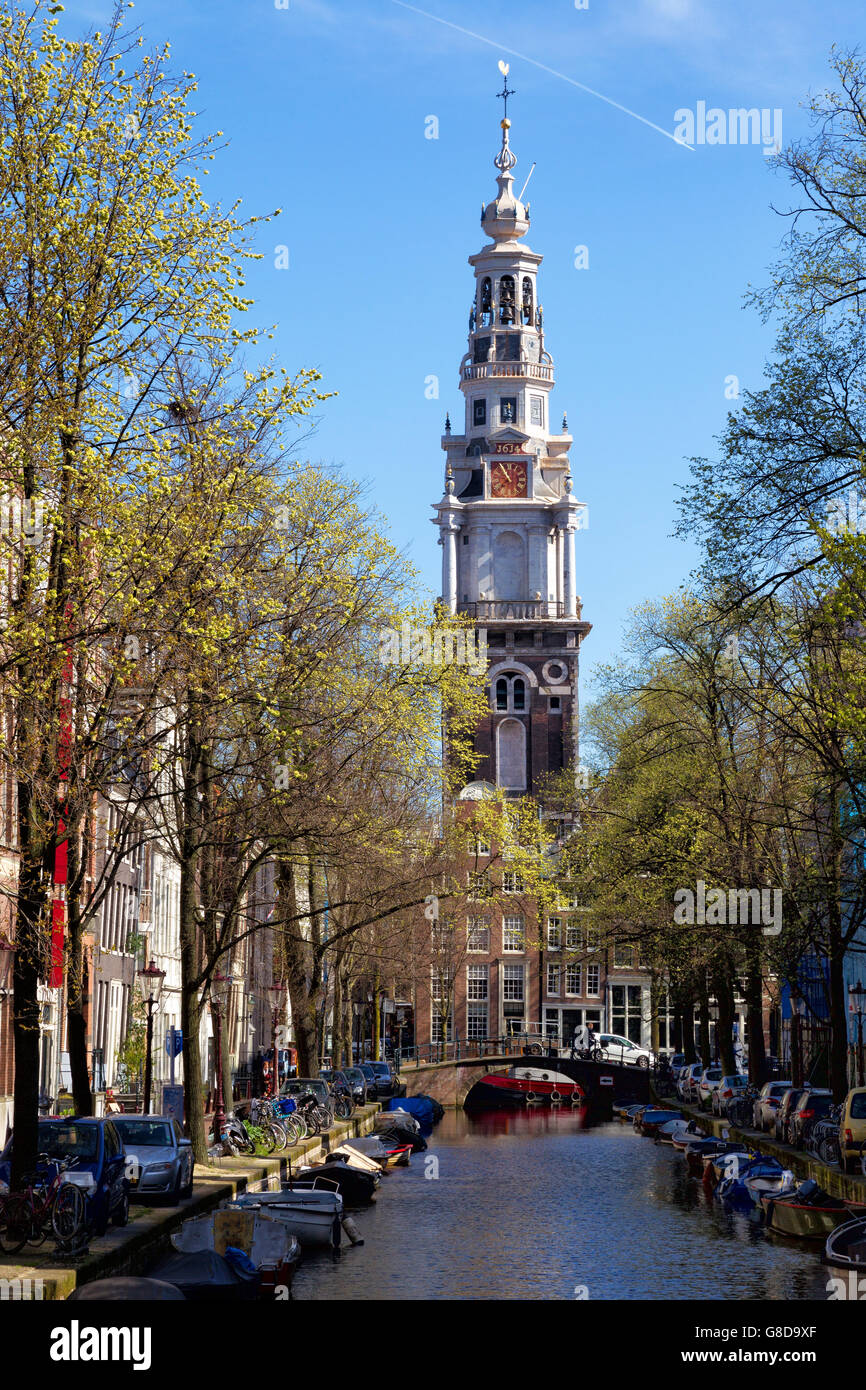 View along the Groenburgwal canal towards the Zuiderkerk in downtown Amsterdam, Netherlands in spring. Stock Photo