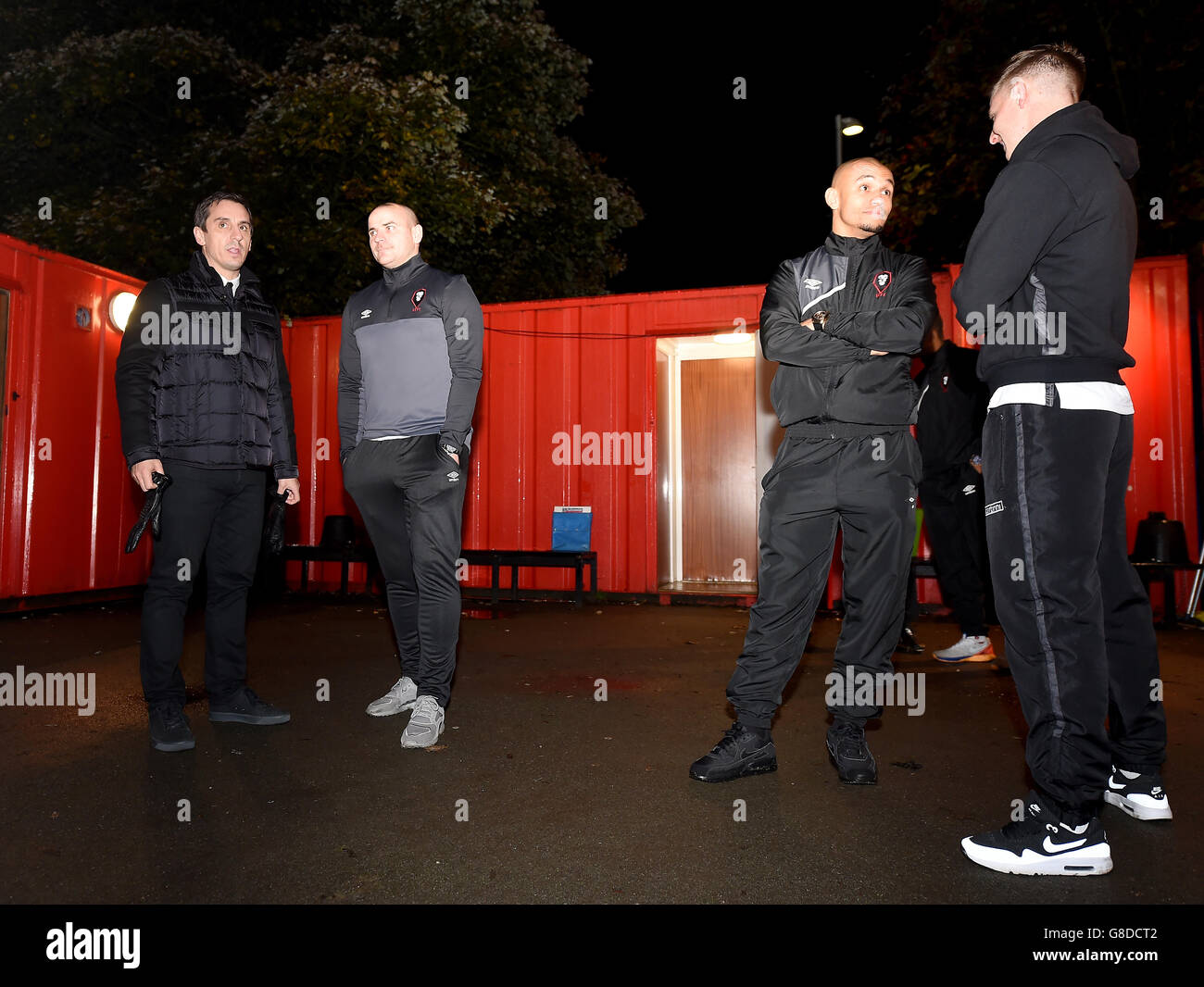 Salford City co-owner Gary Neville (left) with co-manager Bernard Morley (second left) during the Emirates FA Cup, First Round match at Moor Lane, Salford. Stock Photo