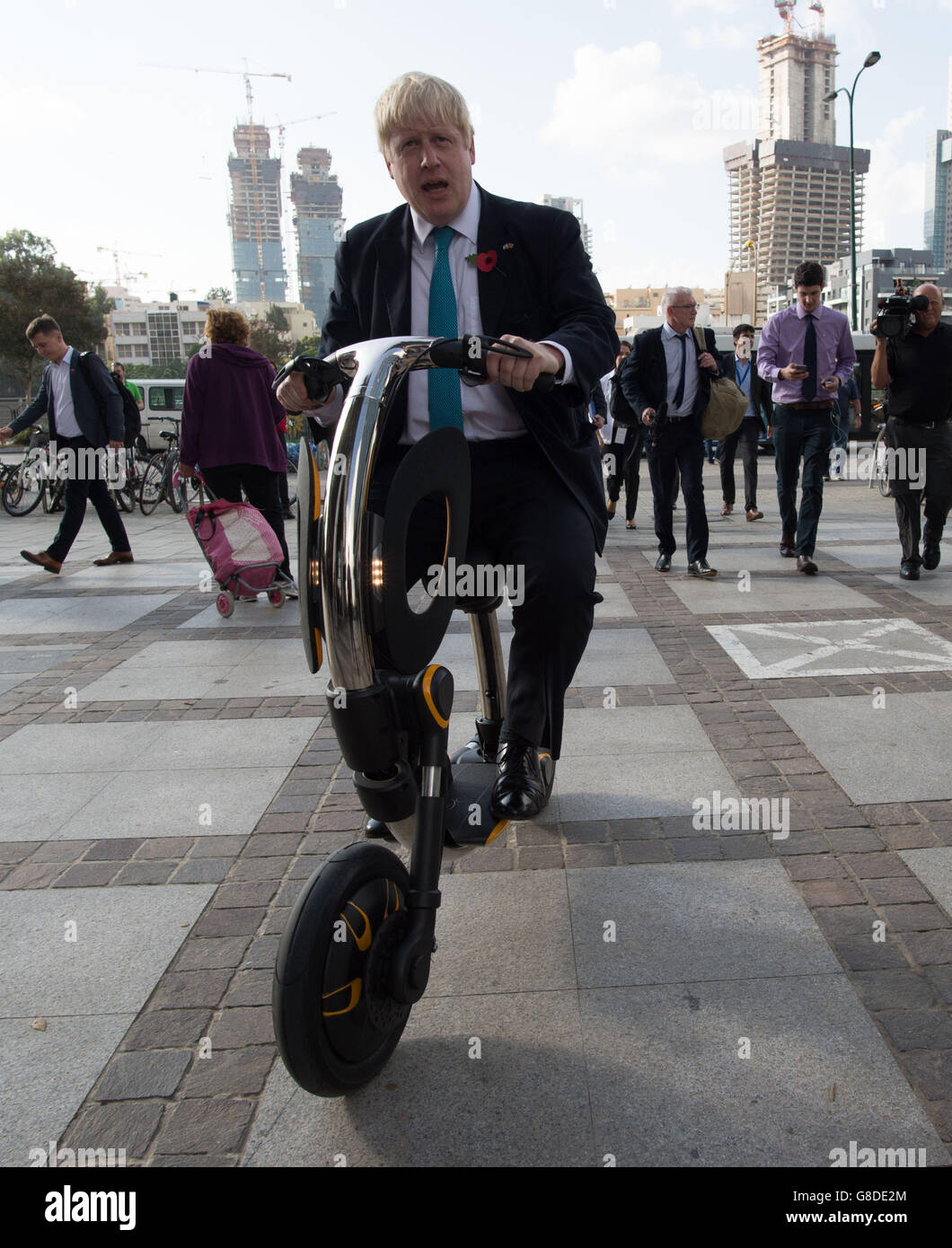 Mayor of London Boris Johnson rides an electric scooter called the INU before visiting Google's offices in Tel Aviv, Israel, at the start of a four day trade visit to the region. Stock Photo