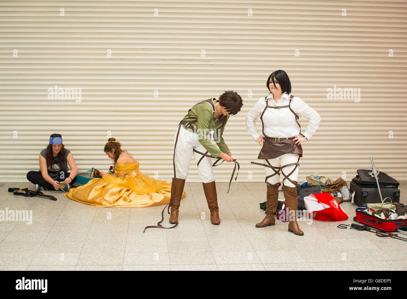 Participants put the finishing touches to their outfits at the MCM London Comic Con at ExCeL London. Stock Photo