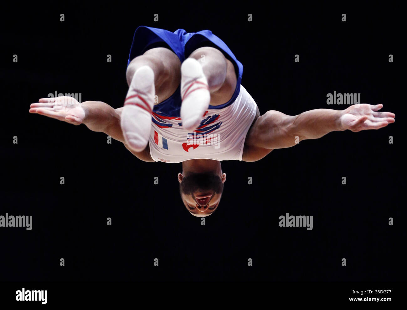 France's Axel Augis competes on the Floor Exercise during day four of the 2015 World Gymnastic Championships at The SSE Hydro, Glasgow. Stock Photo