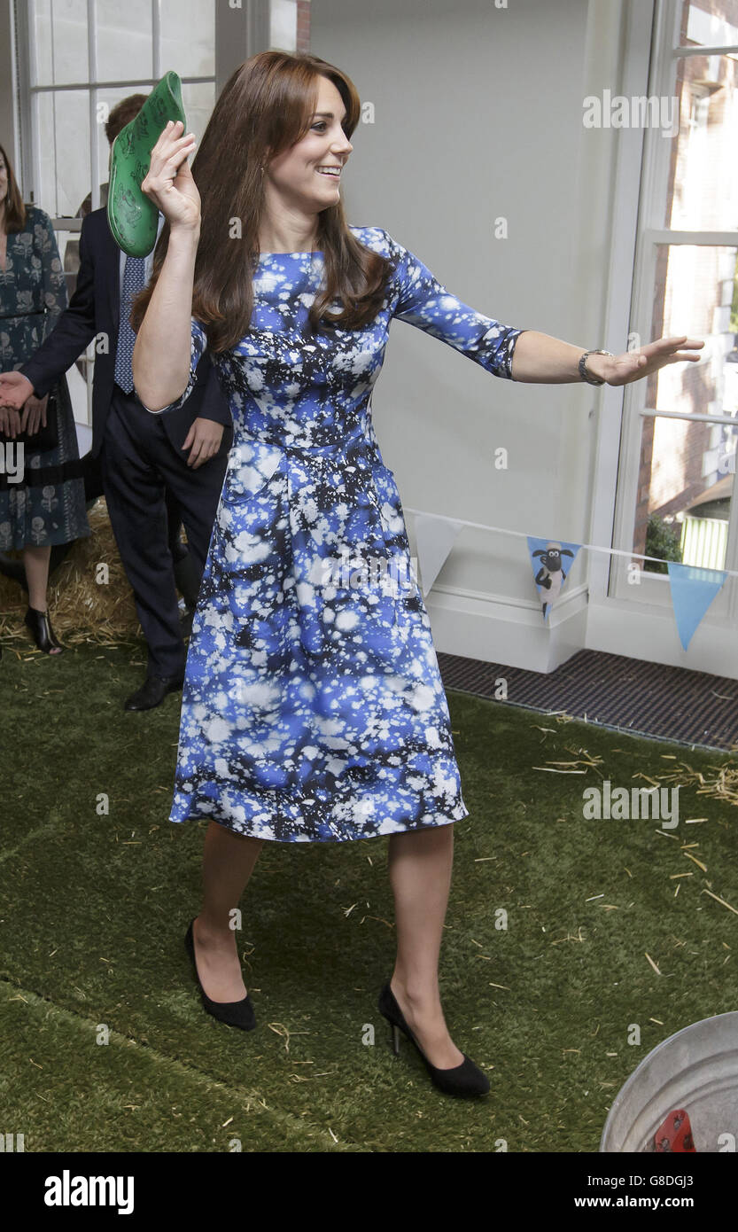 The Duchess of Cambridge takes part in welly wanging with children and representatives from charities and Aardman Animations, during a meeting of the Charities Forum at BAFTA on Piccadilly in London. Stock Photo