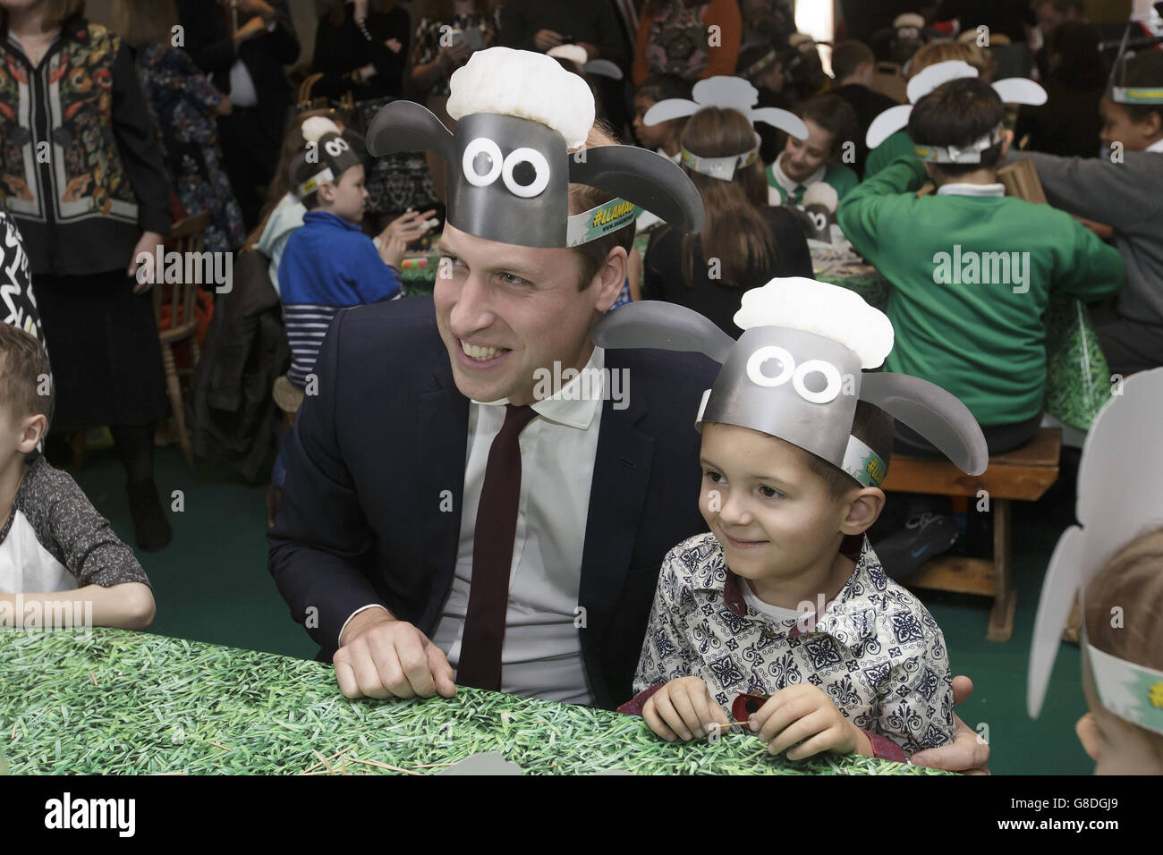 The Duke of Cambridge poses with children and representatives from charities and Aardman Animations, during a meeting of the Charities Forum at BAFTA on Piccadilly in London. Stock Photo