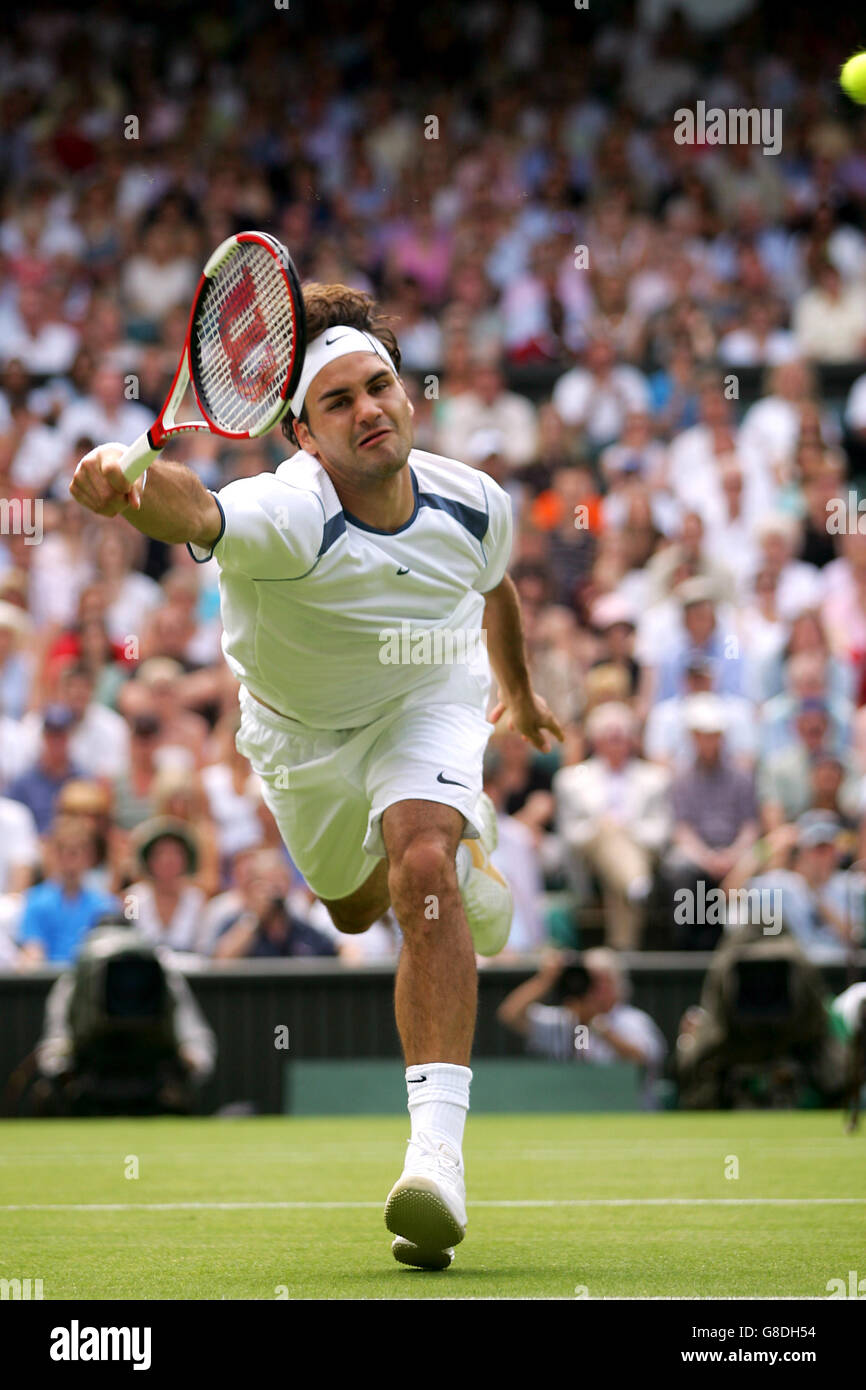 Switzerland's Roger Federer stretches for a ball during his match against France's Paul-Henri Mathieu Stock Photo