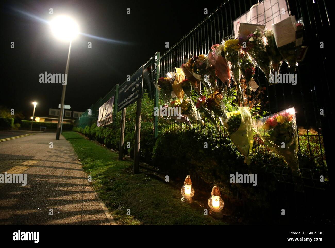 A few flowers and tributes to Bailey Gwynne sit at the gates of Cults Academy in Aberdeen, after most of the tributes have been moved to the school garden, ahead of the school reopening tomorrow following the death of the pupil last week. Stock Photo