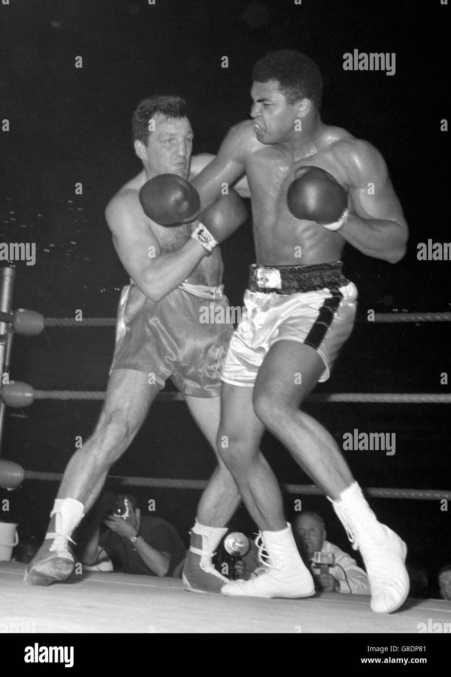 Muhammad Ali (r) scowls as he misses with a right during the World Heavyweight Championship at Earls Court Arena, London. Stock Photo