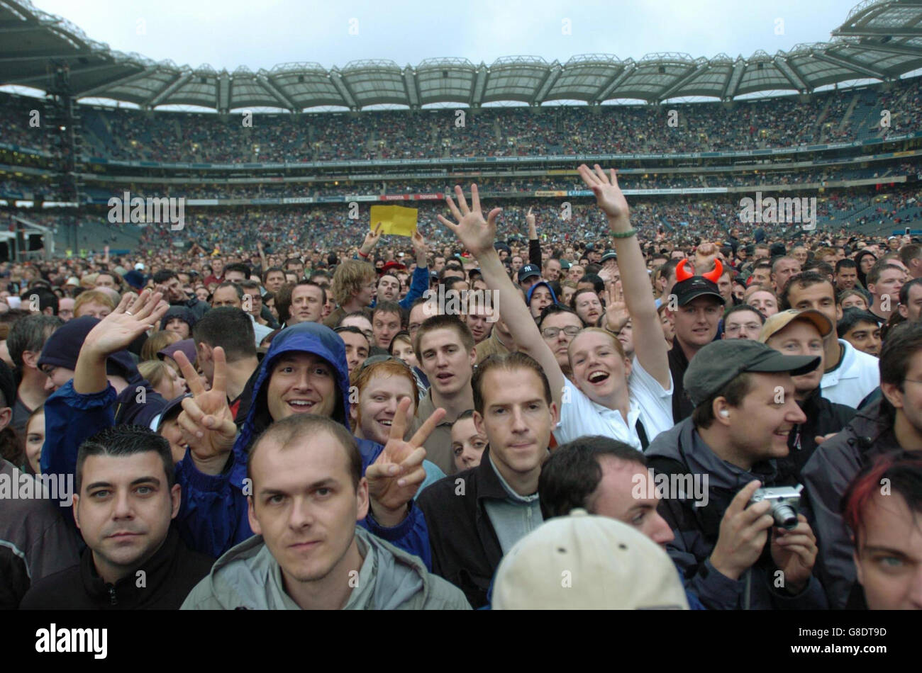 U2 Concert, Croke Park. Fans stand in light drizzle before U2 perform. Stock Photo