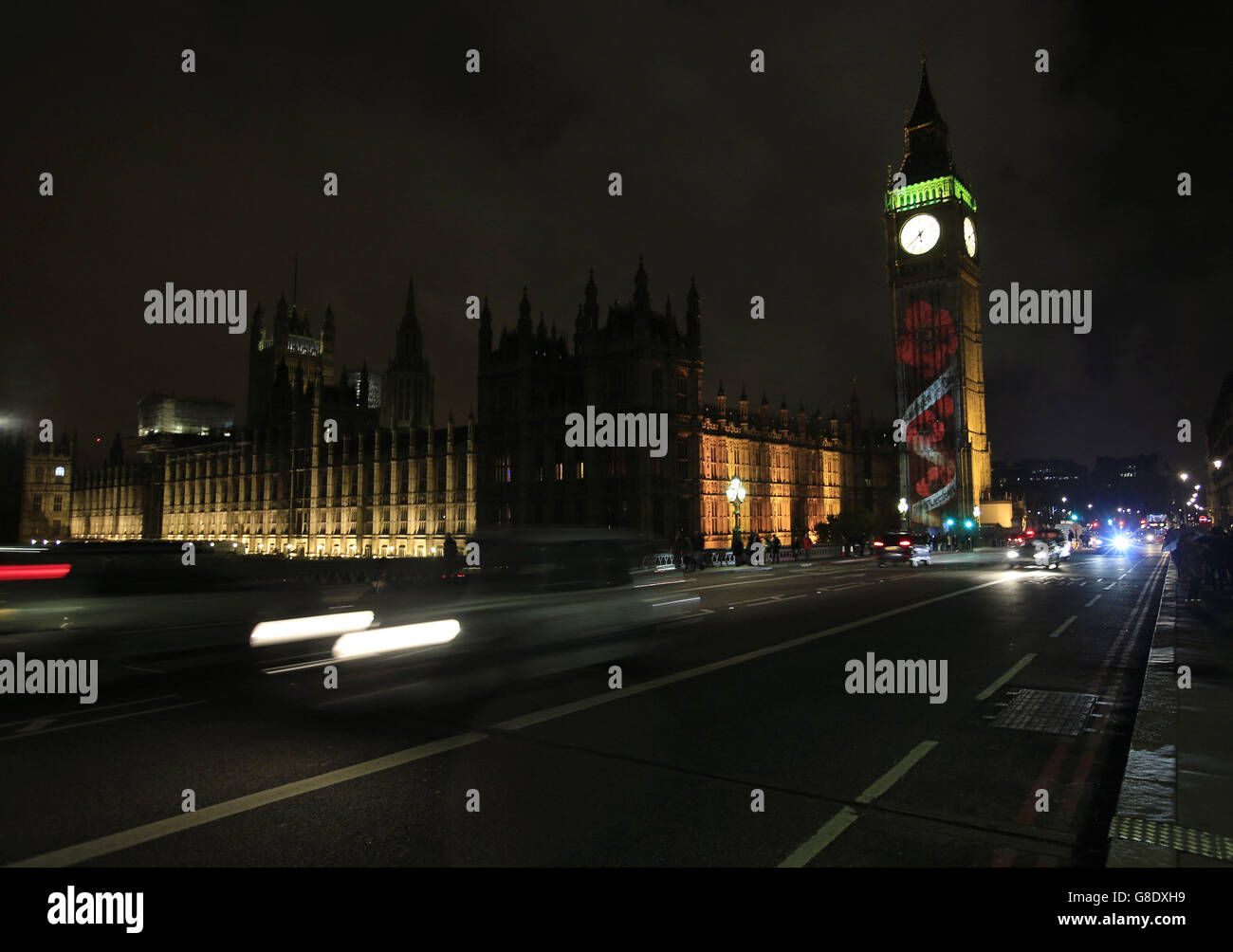 Poppies are projected onto the Elizabeth Tower which houses Big Ben ...