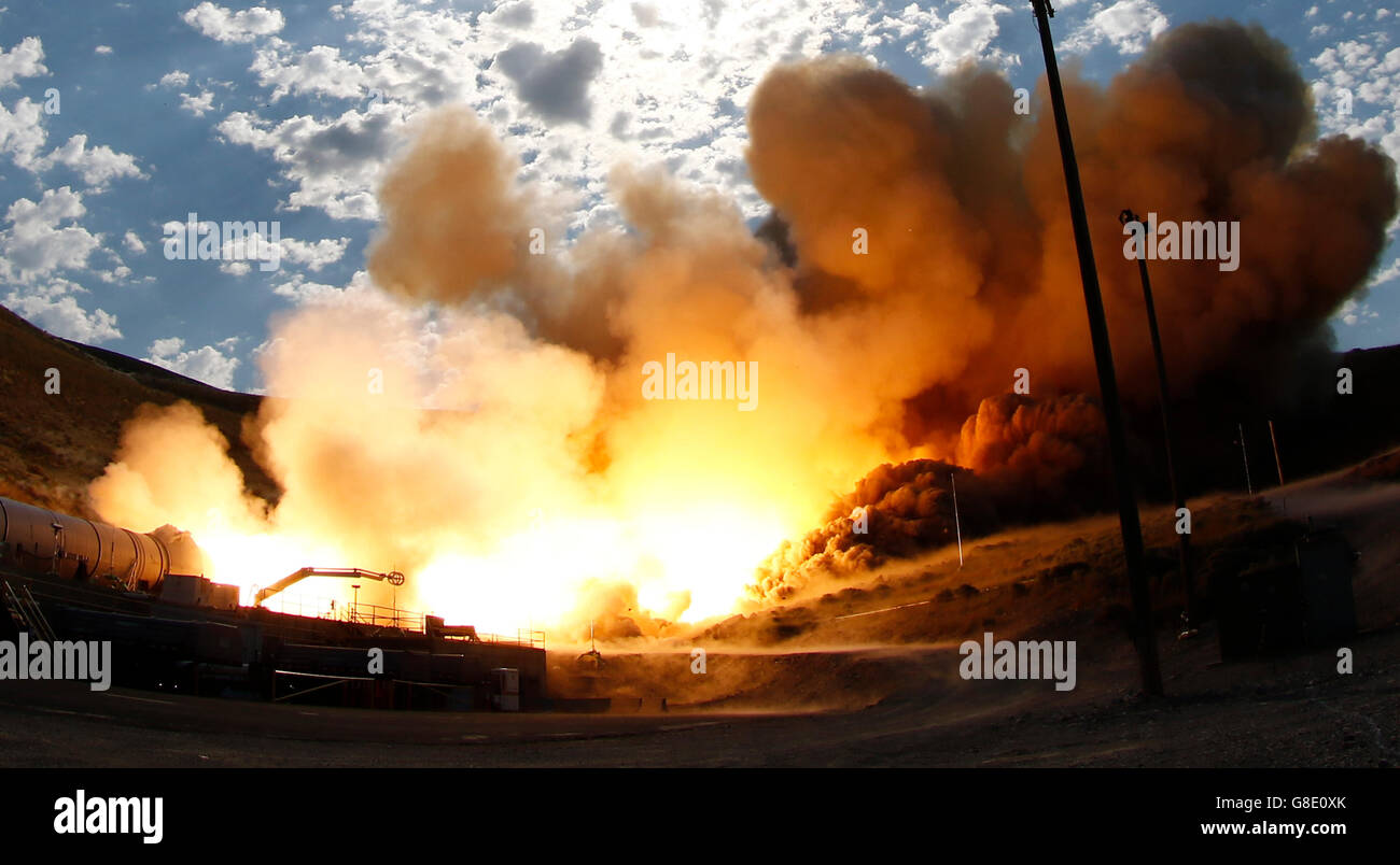 Promontory, Utah, USA. 28th June, 2016. Raw fire power is blasted into a hillside as ATK test fires a solid rocket booster motor that burns 6 tons of propellant each second with expanding gases and flames exiting the nozzle at speeds in excess of Mach 3 and temperatures reaching 3,700 degrees Fahrenheit Tuesday. Orbital ATK test fire happen at 9:05am MT time and NASA will use measurements from more than 530 data channels to evaluate motor performance, acoustics, motor vibrations, nozzle modifications, insulation upgrades. Credit:  ZUMA Press, Inc./Alamy Live News Stock Photo