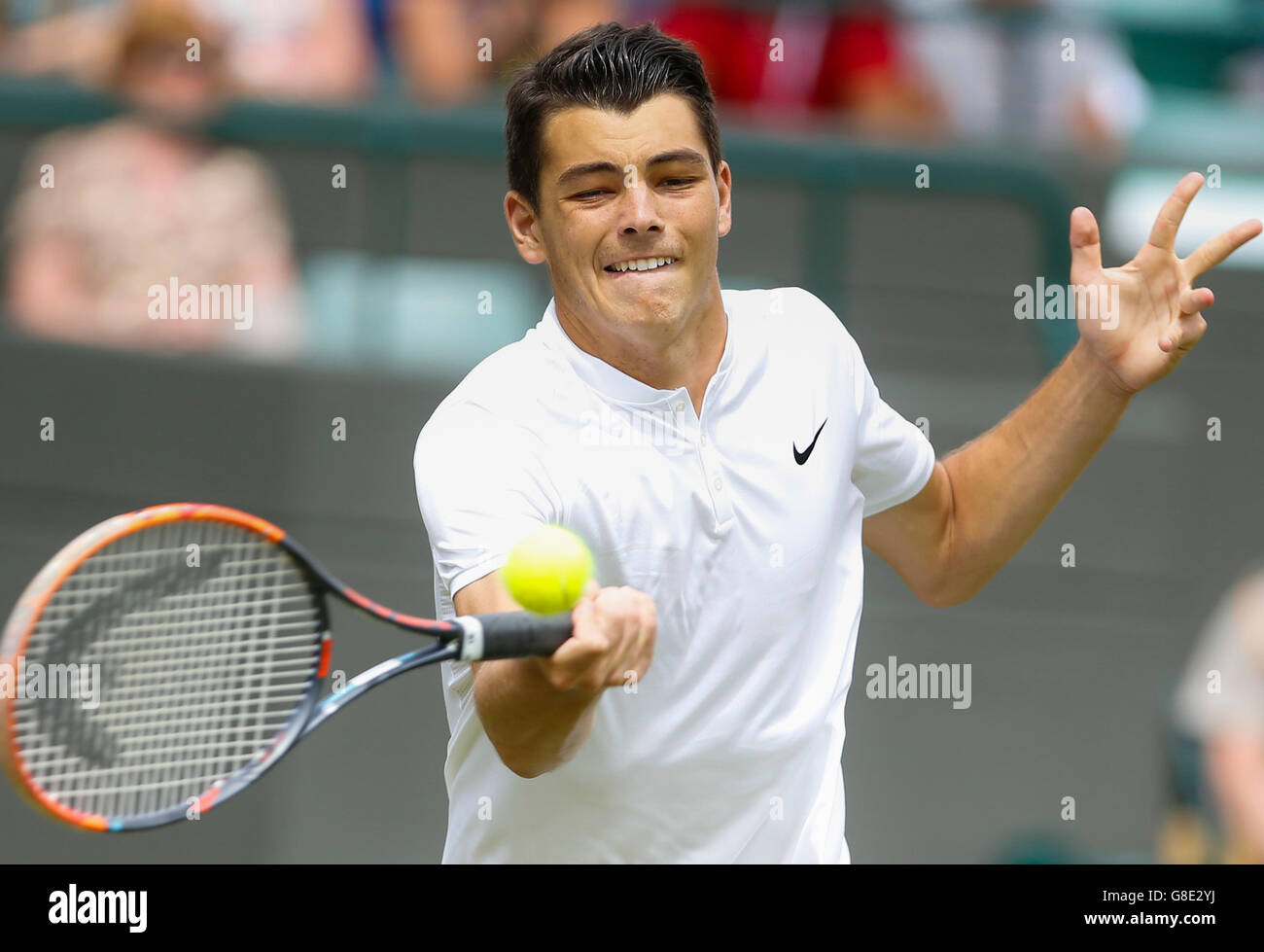 London, UK. 28th June, 2016. Taylor Fritz of the United States returns the ball during the men's singles first round match against Stan Wawrinka of Switzerland on Day 2 of the 2016 Wimbledon Tennis Championships in London, on June 28, 2016. Taylor Fritz lost 1-3. © Ye Pingfan/Xinhua/Alamy Live News Stock Photo