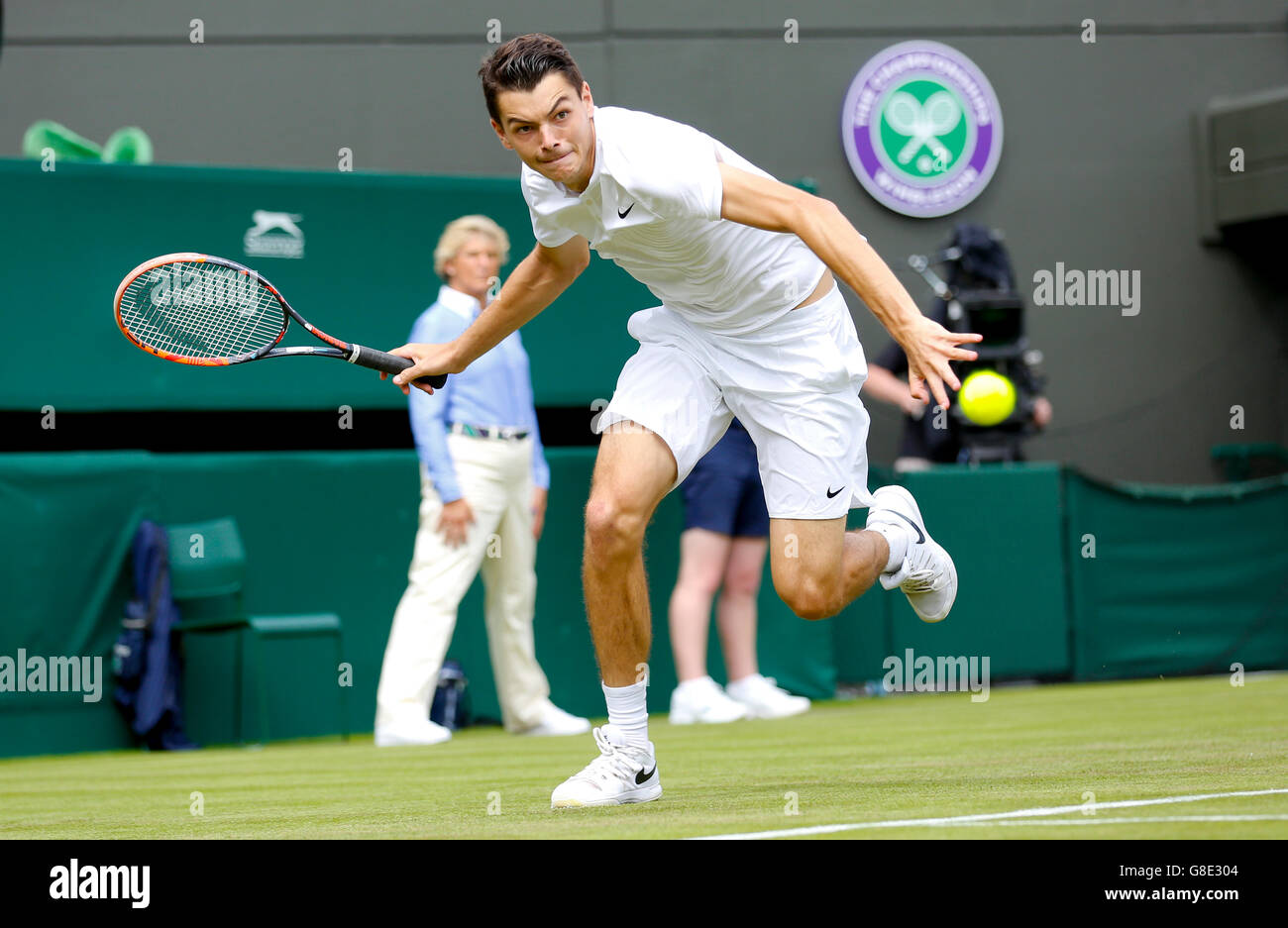 London, UK. 28th June, 2016. Taylor Fritz of the United States returns the ball during the men's singles first round match against Stan Wawrinka of Switzerland on Day 2 of the 2016 Wimbledon Tennis Championships in London, on June 28, 2016. Taylor Fritz lost 1-3. © Ye Pingfan/Xinhua/Alamy Live News Stock Photo