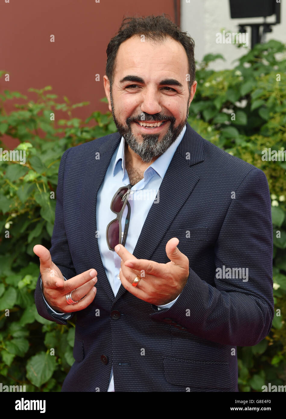 Munich, Germany. 28th June, 2016. Actor Adnan Maral arrives for the Bavaria reception in Munich, Germany, 28 June 2016. The reception is held as part of the Munich Film Festival. Photo: TOBIAS HASE/dpa/Alamy Live News Stock Photo
