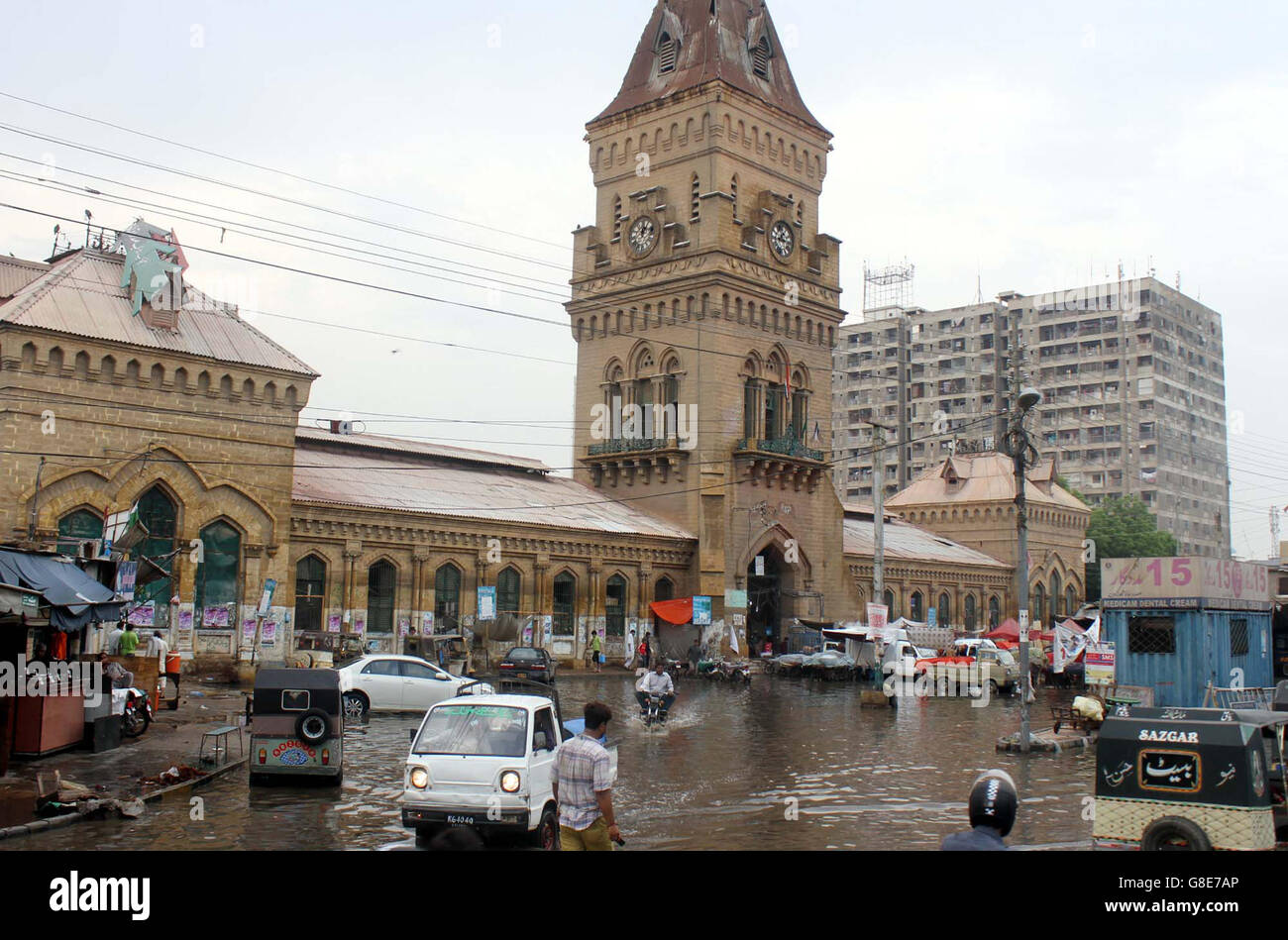 KARACHI, PAKISTAN, JUN 29: View of stagnant rainwater at Empress Market Saddar after downpour of monsoon season which is creating problems for residents and commuters showing the negligence of concerned department, in Karachi on Wednesday, June 29, 2016. The metropolitan Wednesday continued to get good monsoon showers for 2nd consecutive day, as heavy to light rain coupled with gusty winds occurred in almost all areas of the city. The Met Office says the rain spell will continue till tomorrow. The weather department has forecast countrywide downpour today during next 24 hours. (S.Imran A Stock Photo