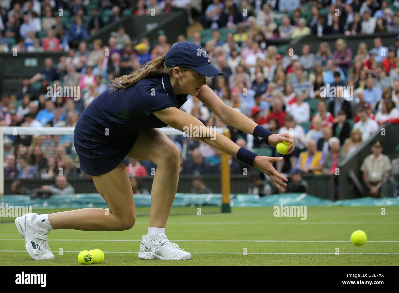 Wimbledon, London, UK. 29th June, 2016. Ball Girl With Tennis Balls The