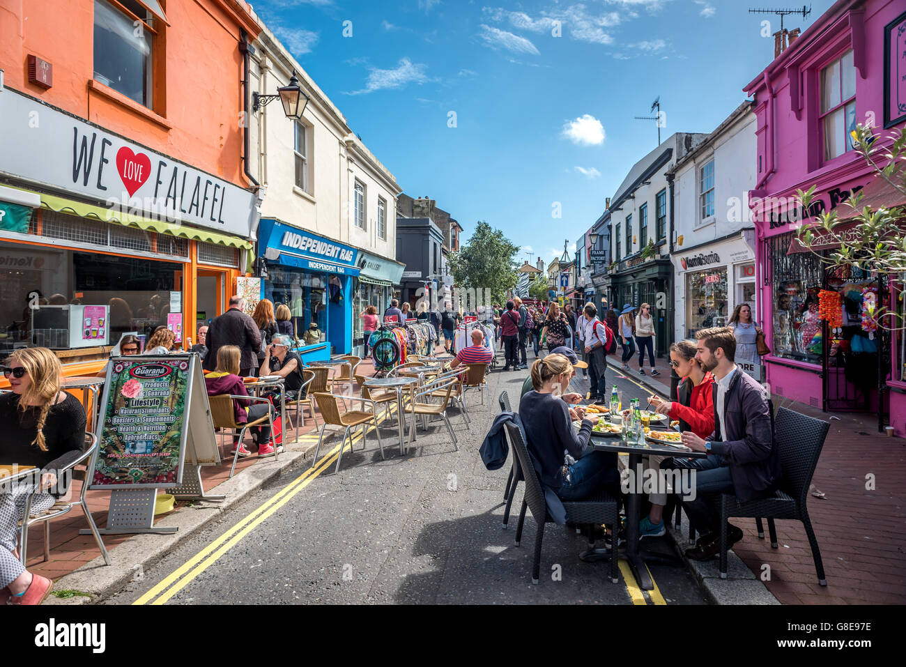 Residents enjoying a beautiful summer's afternoon in Brighton, East Sussex. Stock Photo