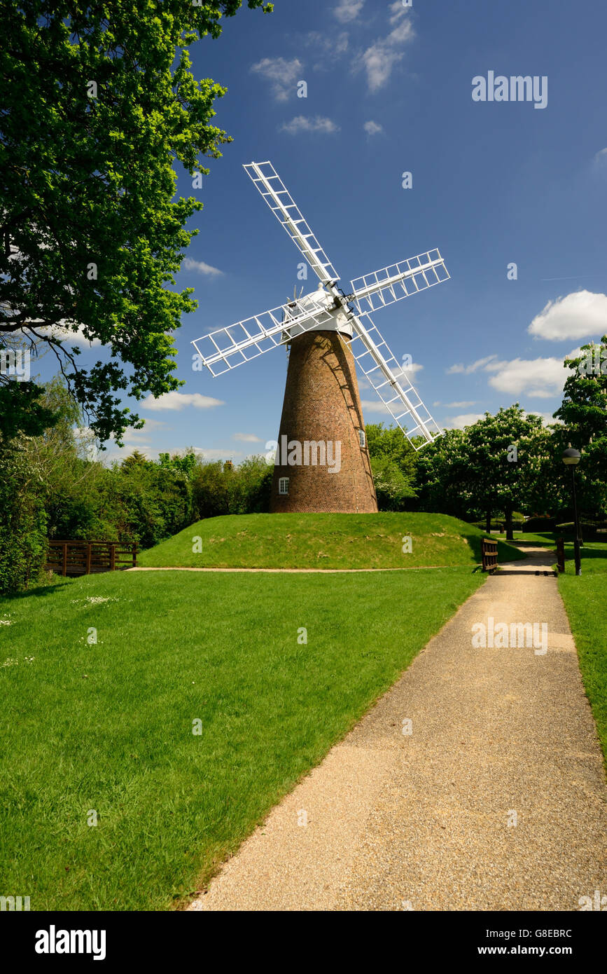 Preserved windmill at a modern business park. Stock Photo