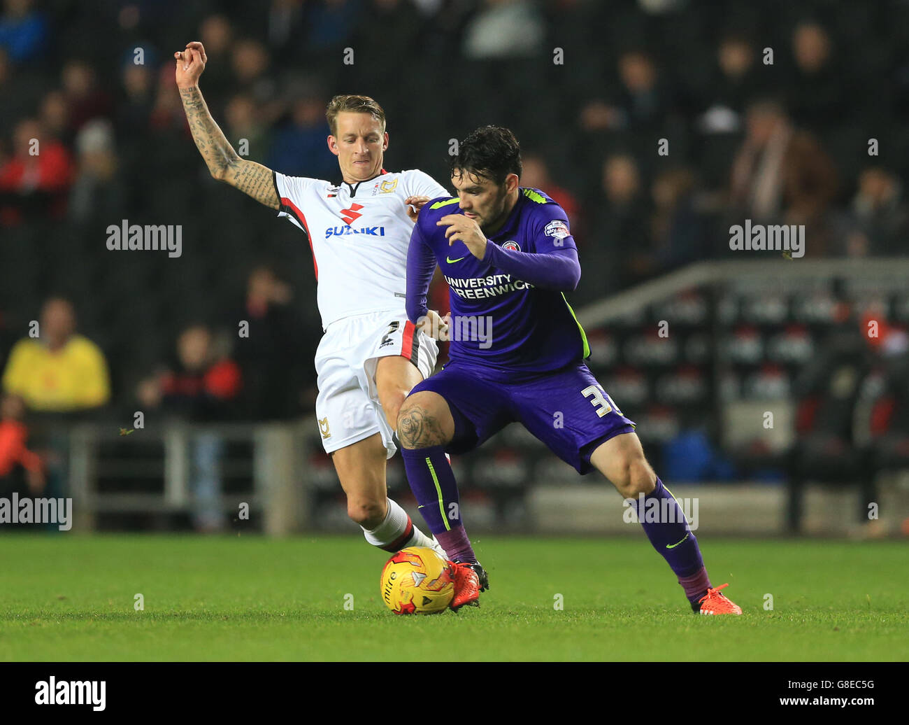 Milton Keynes Dons' Carl Baker (left) and Charlton Athletic's Tony Watt