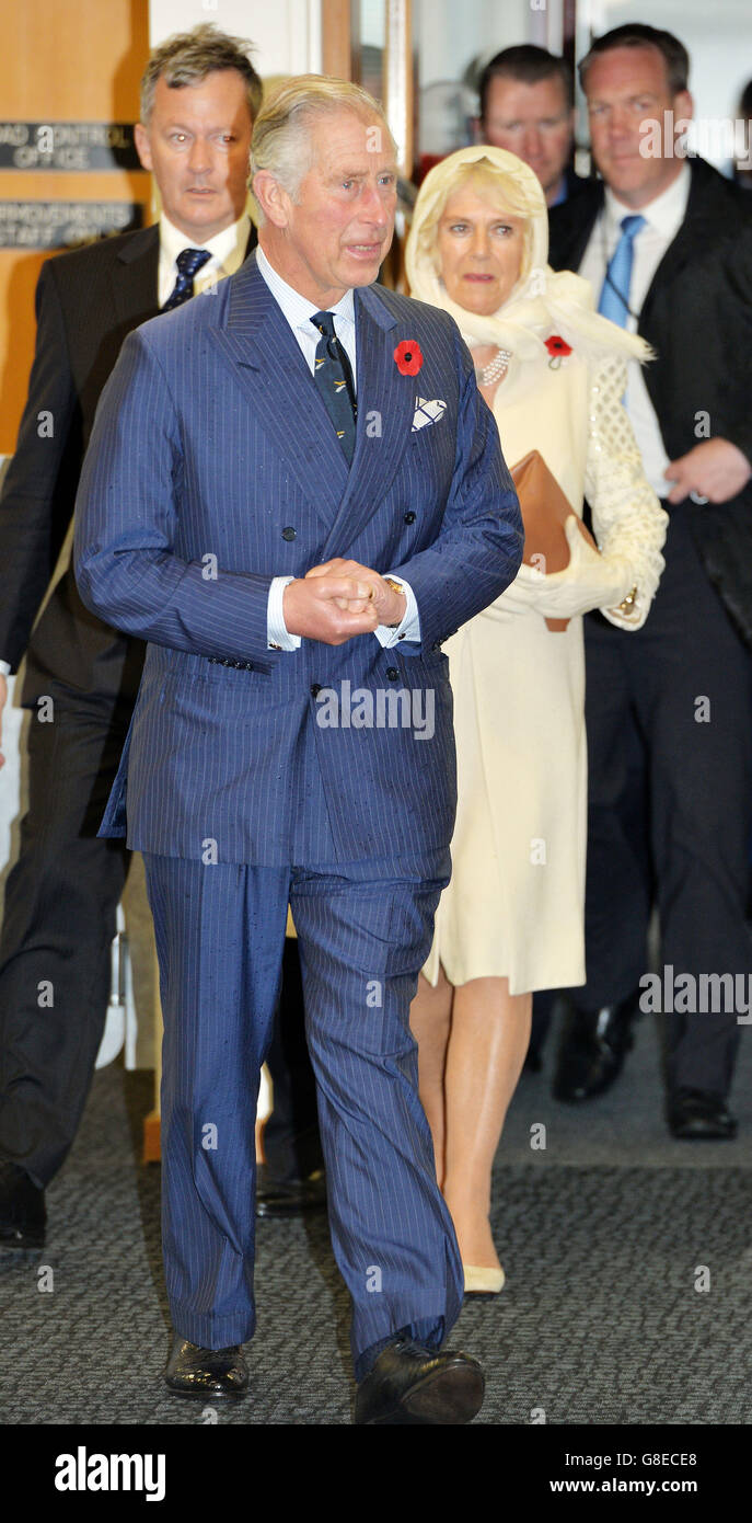 The Prince of Wales and Duchess of Cornwall walk into the VIP Terminal, after arriving by plane at Wellington Airport, to start of a week long tour of New Zealand before travelling on to Australia next Tuesday. Stock Photo