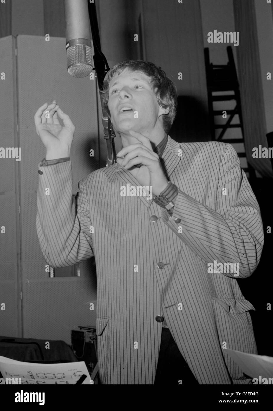 Getting in tune on his own is Paul Jones at the EMI Studio, St John's Wood, London. He was making his first recording session as a solo artist since leaving the Manfred Mann group. Stock Photo