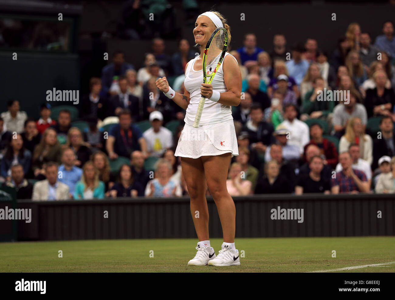 Svetlana Kuznetsova celebrates victory over Caroline Wozniacki on day Two of the Wimbledon Championships at the All England Lawn Tennis and Croquet Club, Wimbledon. Stock Photo