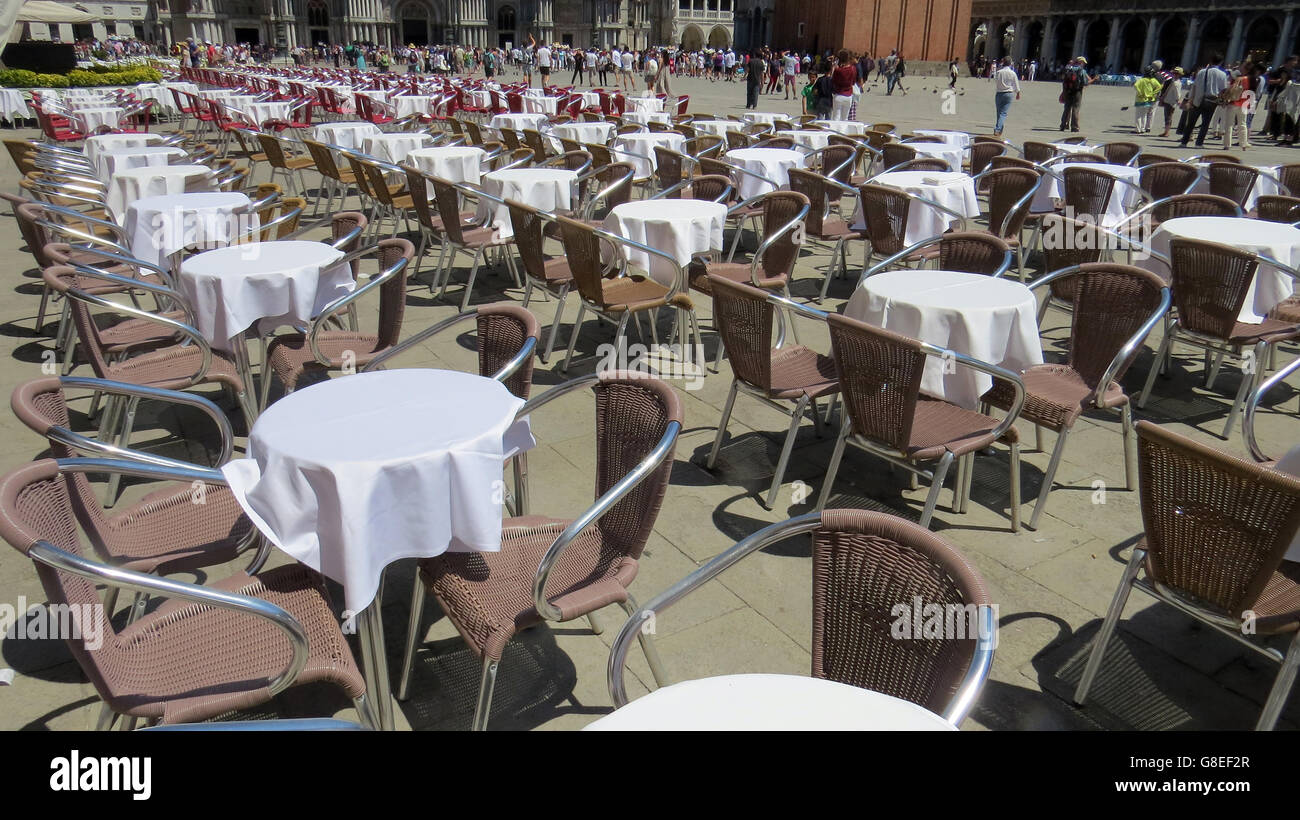 VENICE, Italy. Cafe tables in St Mark's Square. Photo Tony Gale Stock Photo