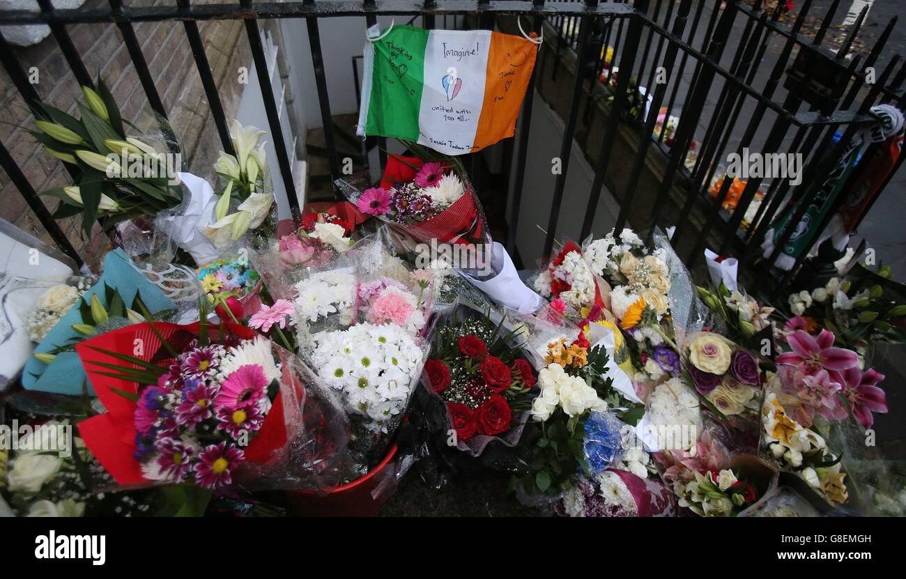 Flowers and messages of condolence for the victims of the attacks in Paris outside the French Embassy in Dublin. Stock Photo