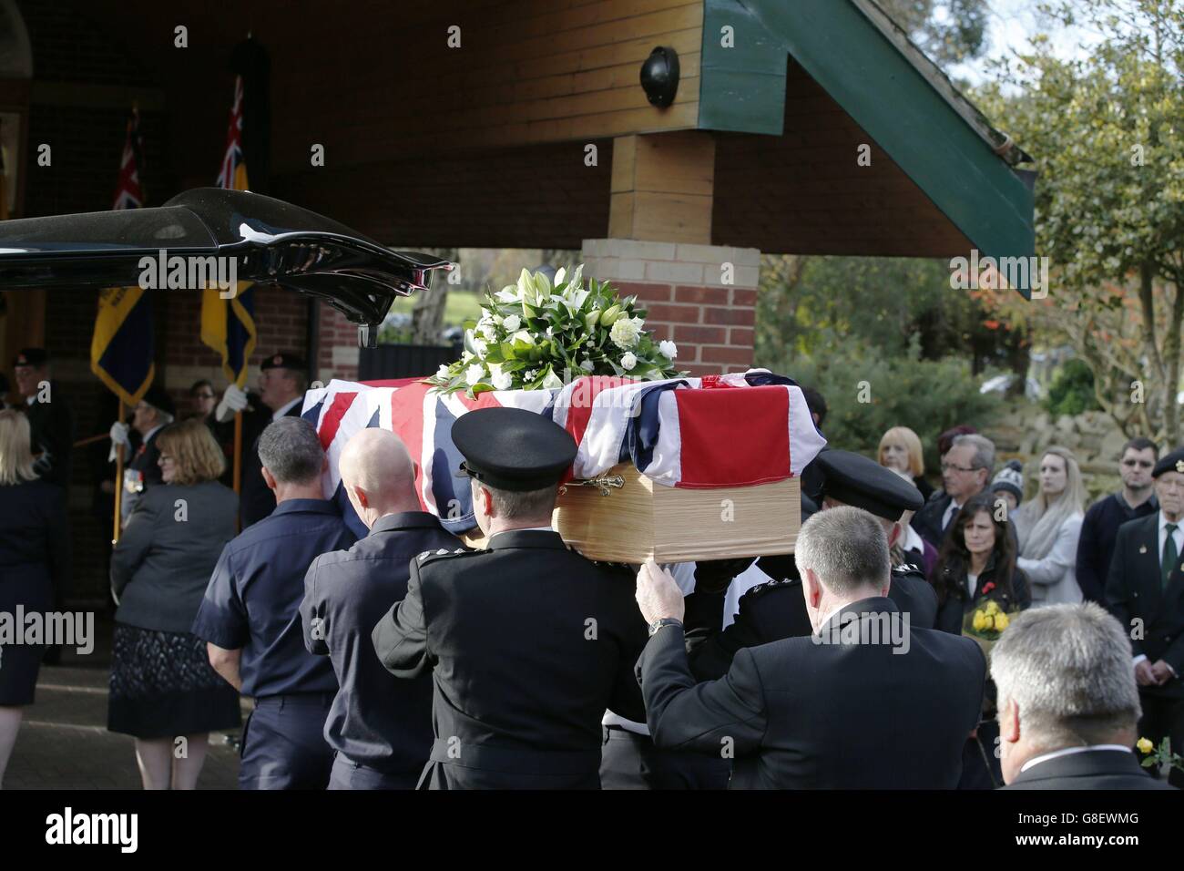 The coffin of war veteran Tom Bryan, 92, arrives at Stockport ...