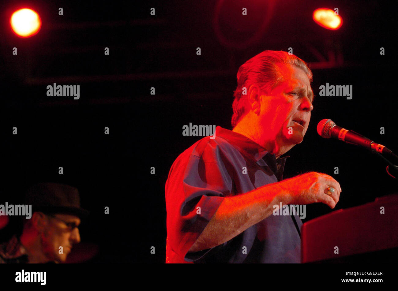 Former Beach Boys singer, Brian Wilson, performing with his band. Stock Photo