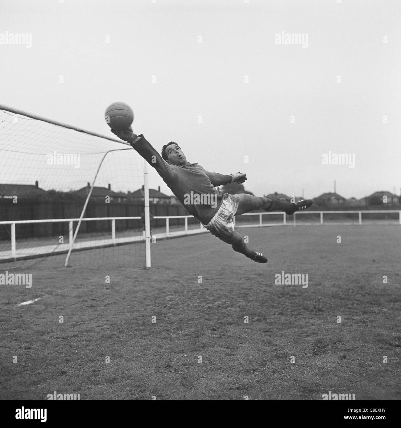 Portugal goalkeeper Americo Lopes makes a flying save Stock Photo