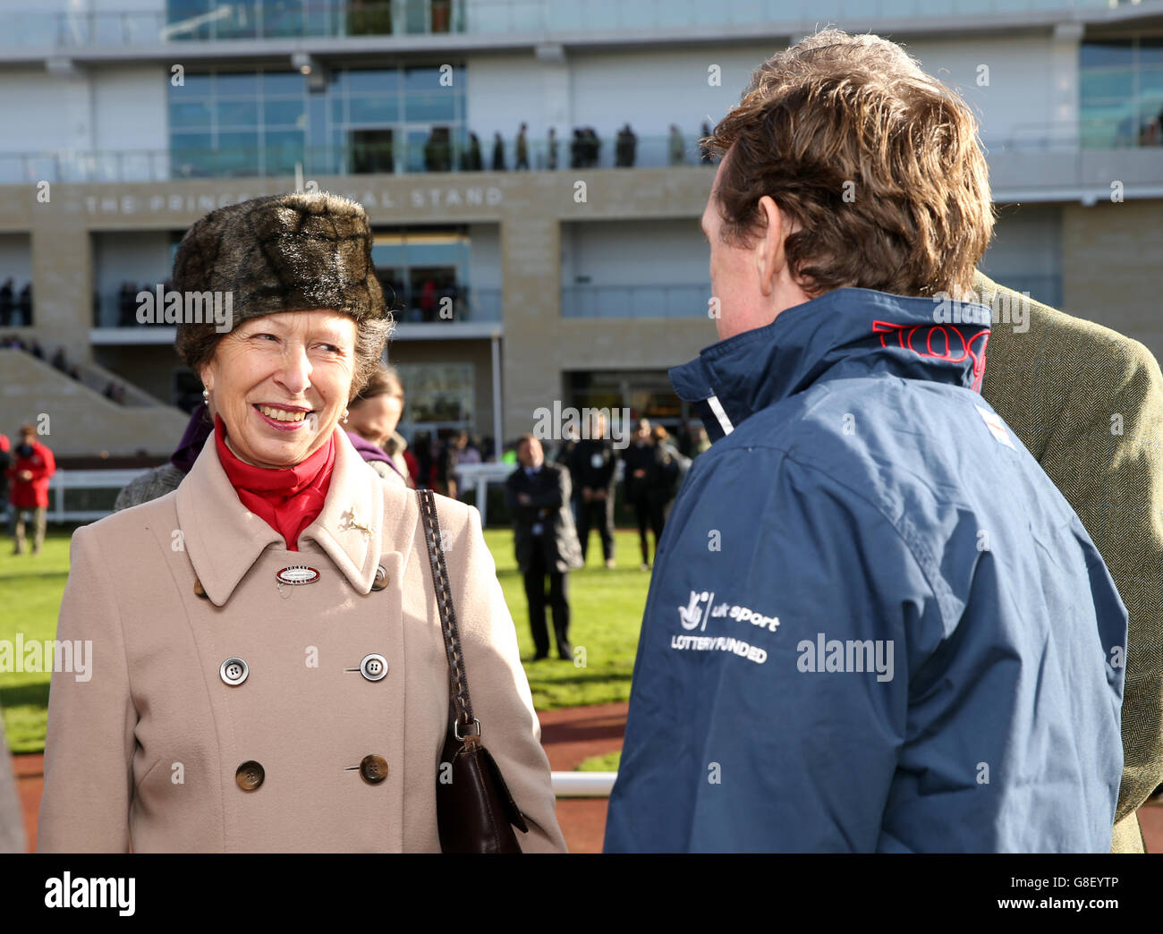 Princess Anne speaks with jockey AP McCoy after she officially opened The Princess Royal Grandstand during day one of The Open at Cheltenham racecourse, Cheltenham. Stock Photo