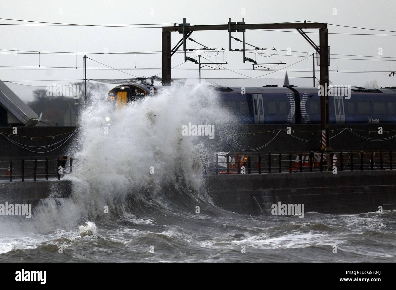 A train in Saltcoats, Scotland, as Storm Abigail hits the UK Stock ...