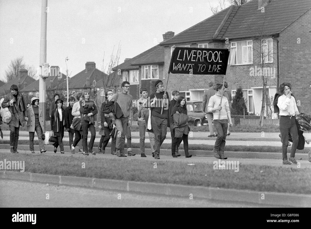 Teenagers from Liverpool march along the Uxbridge Road towards London. They were just a few of the thousands of Campaign for Nuclear Disarmament marchers during the annual Easter March to London, where a rally will be held tomorrow in Trafalgar Square. Stock Photo