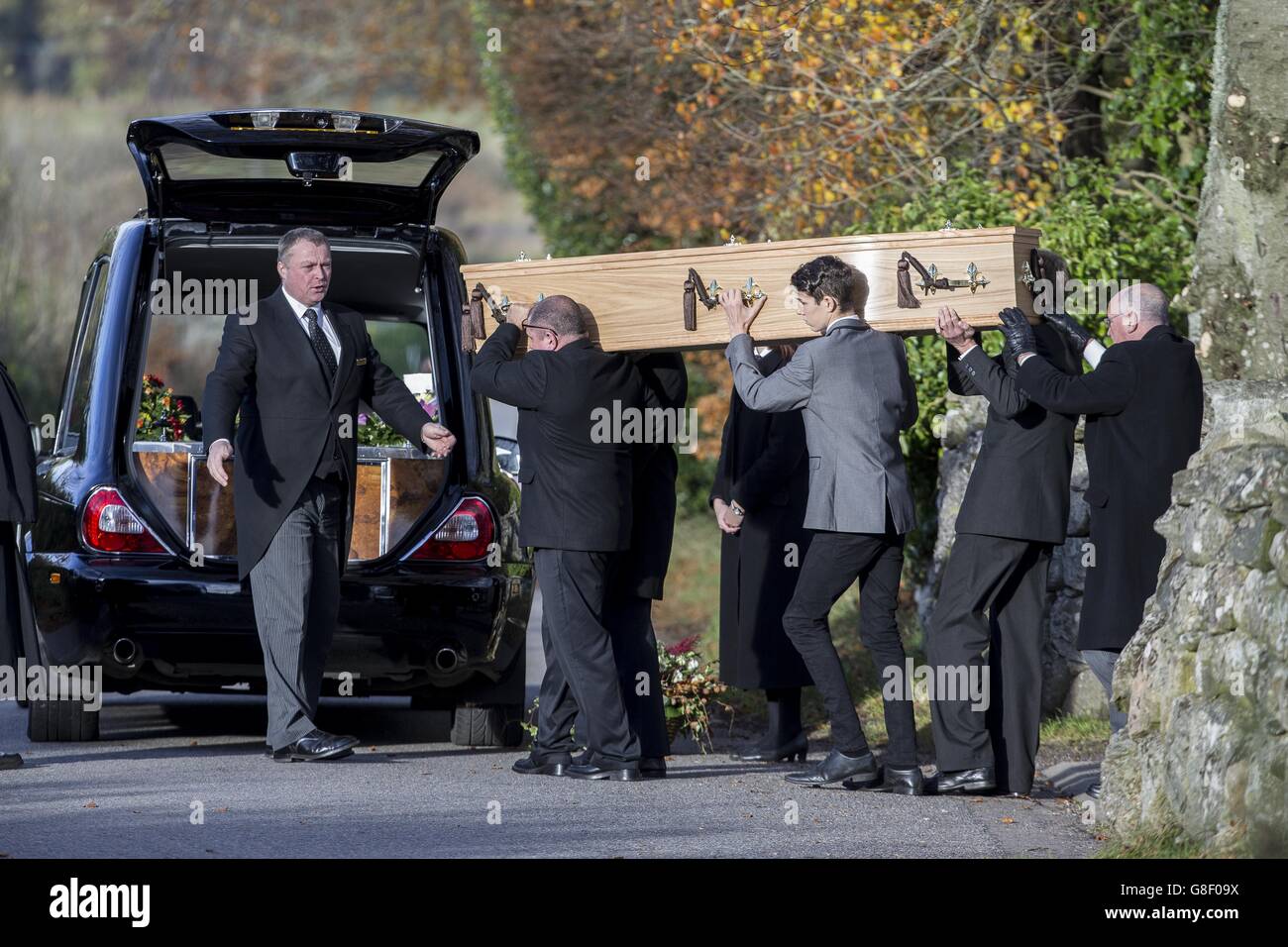 The coffin of Bailey Gwynne is carried to a hearse following his