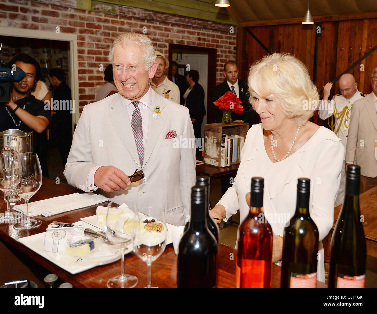The Prince of Wales who is sixty seven years old today, with the Duchess of Cornwall, before they try some of the produce of the Oranje Tractor Winery, outside Albany in southern Australia. Stock Photo