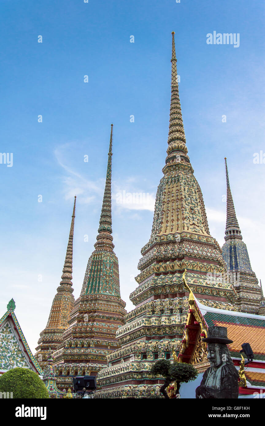 Buddhist Chedis (buddhist stupas) and the Wat Phra Kaew Temple (Temple of the Emerald Buddha) Stock Photo